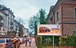 The image shows an analogue advertising space in Zurich