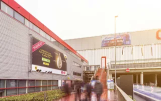 Palexpo with advertising space and people
