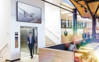 Advertising space in the Swiss Lounge and staff member