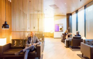 Advertising space and seated guests visible