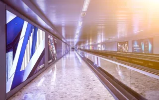 Advertising space next to the moving walkway